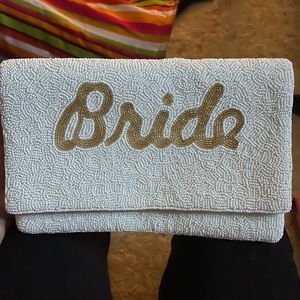 “Bride” clutch with chain